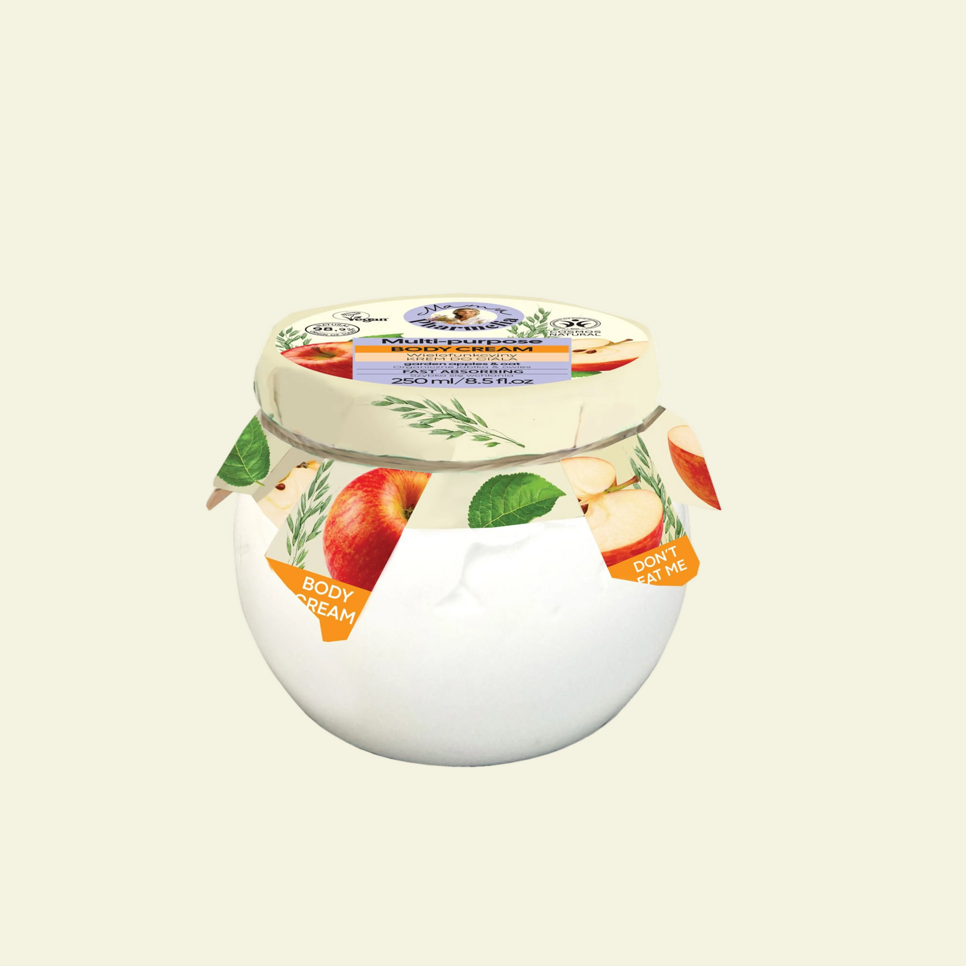 Crema corporal Mama Pharmelia con manzana ecológica y avena, hidratante, calmante y protectora, para una piel suave y luminosa.